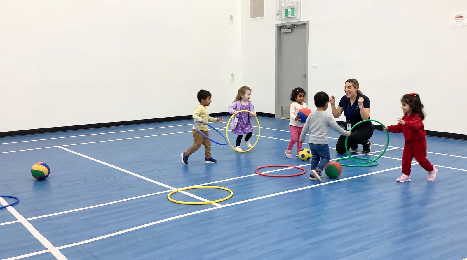 The bright, open gymnasium where even the youngest children get daily room to move at Playbox.
